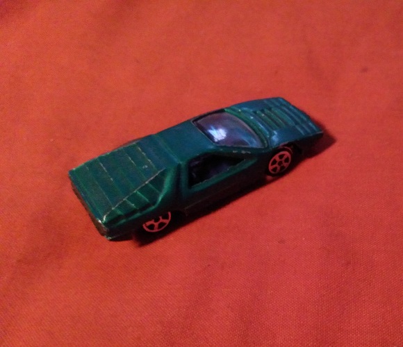 TINS TOYS DARK GREEN CARABO BERTONE T216