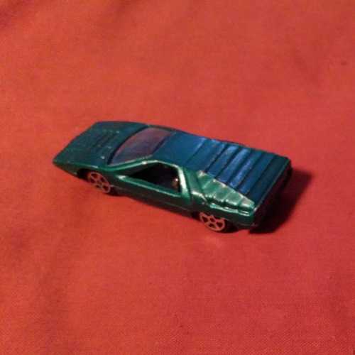 TINS TOYS DARK GREEN CARABO BERTONE T216