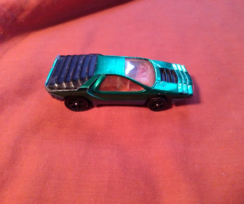 GREEN CORGI JR WITH ORANGE WINDOWS