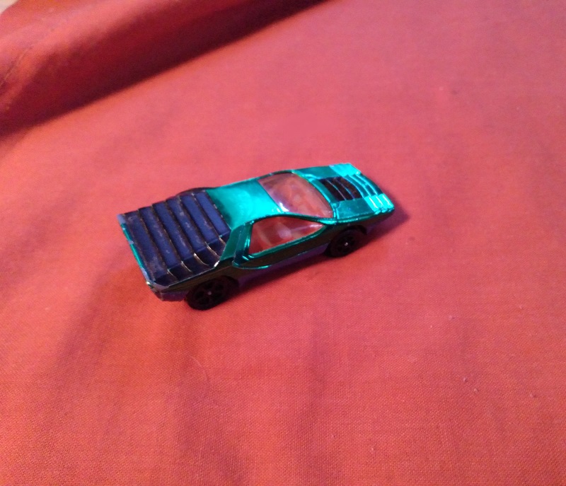 GREEN CORGI JR WITH ORANGE WINDOWS