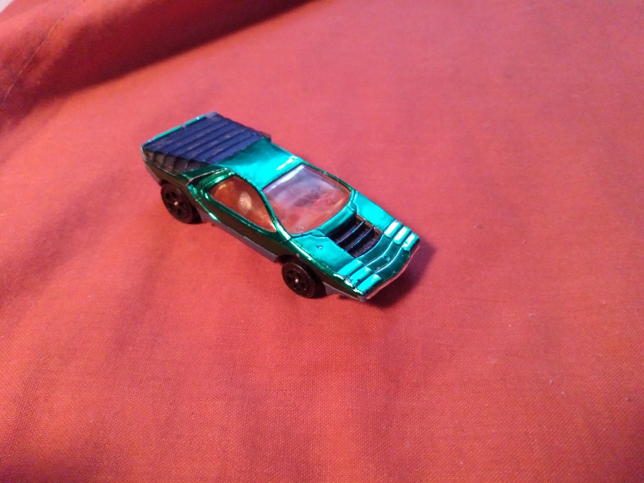 GREEN CORGI JR WITH ORANGE WINDOWS