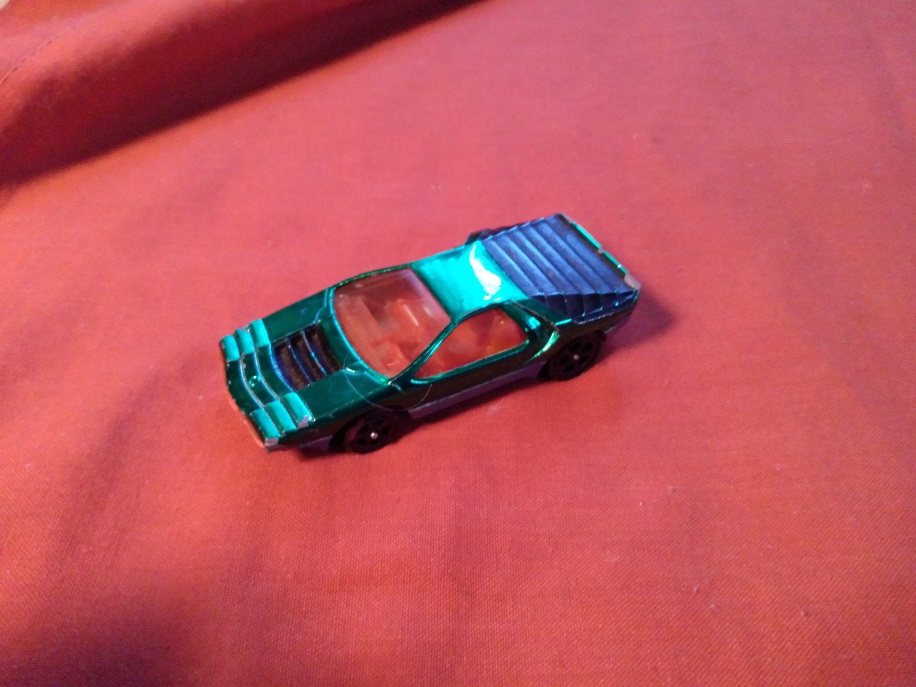 GREEN CORGI JR WITH ORANGE WINDOWS