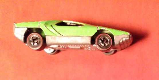 GREEN WITH ORANGE AND BLUE HOT WHEELS CARABO