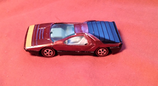 ORANGISH RED HOT WHEELS CARABO