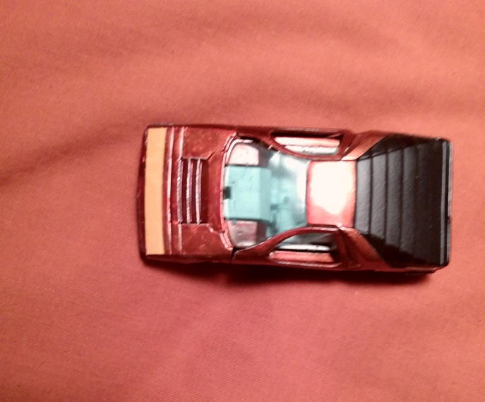 ORANGISH RED HOT WHEELS CARABO