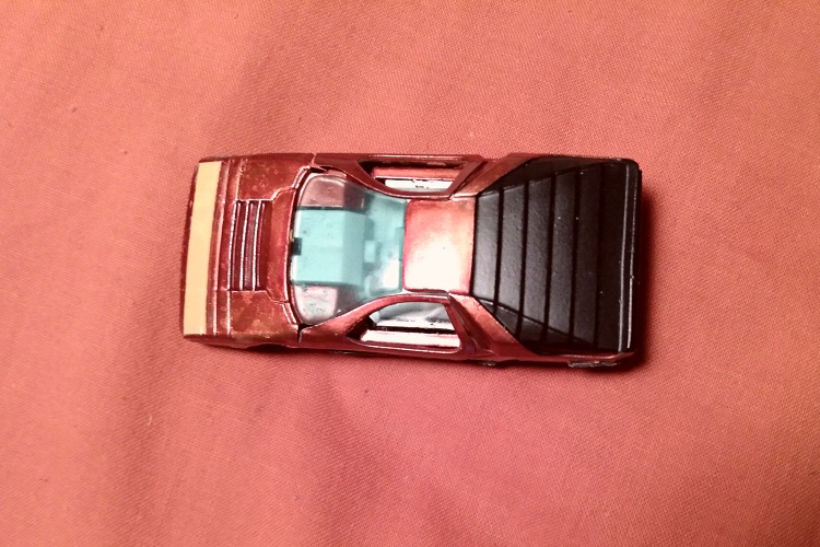 ORANGISH RED HOT WHEELS CARABO