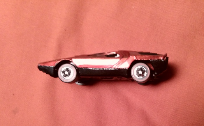 ORANGISH RED HOT WHEELS CARABO