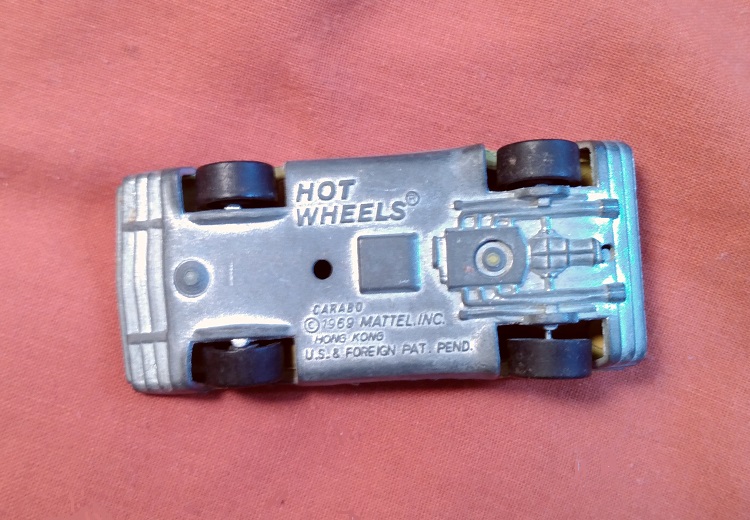 YELLOW HOT WHEELS CARABO WITH DOORS BROKEN OFF