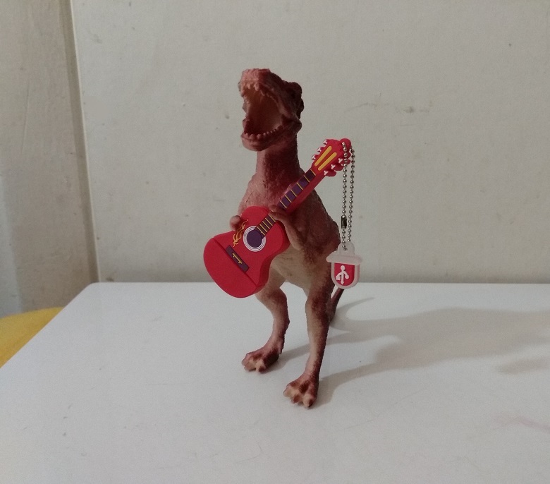 DINOSAUR PLAYING GUITAR