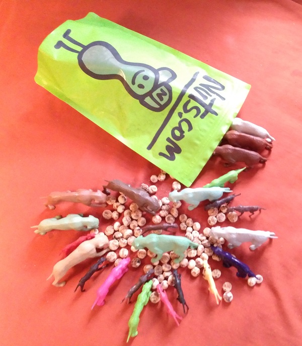 PACK OF SMILODON TEARING UP A BAG OF TIGER NUTS