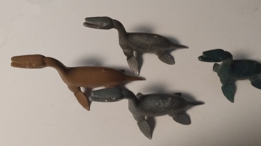 FOUR RARE MARX KRONOSAURS