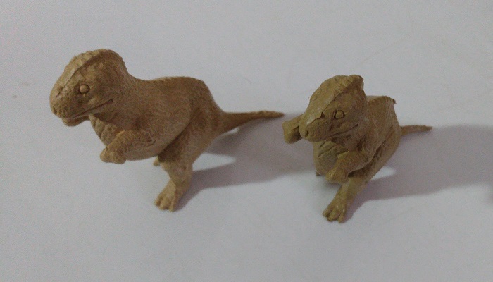 TWO TAN MARX ALLOSAURS