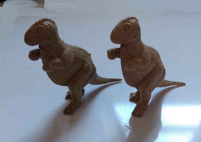 TWO TAN MARX ALLOSAURUS FIGURES