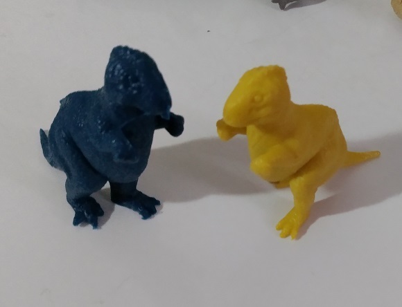 YELLOW AND BLUE MARX ALLOSAURUS FIGURES