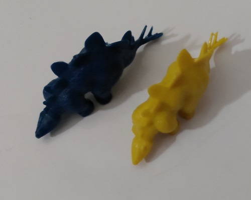 MARX STEGOSAURUS FIGURES IN YELLOW AND BLUE
