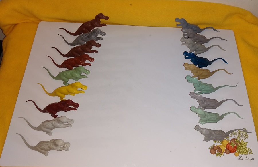 TWO ROWS OF MARX TRACHODONS FACING EACH OTHER