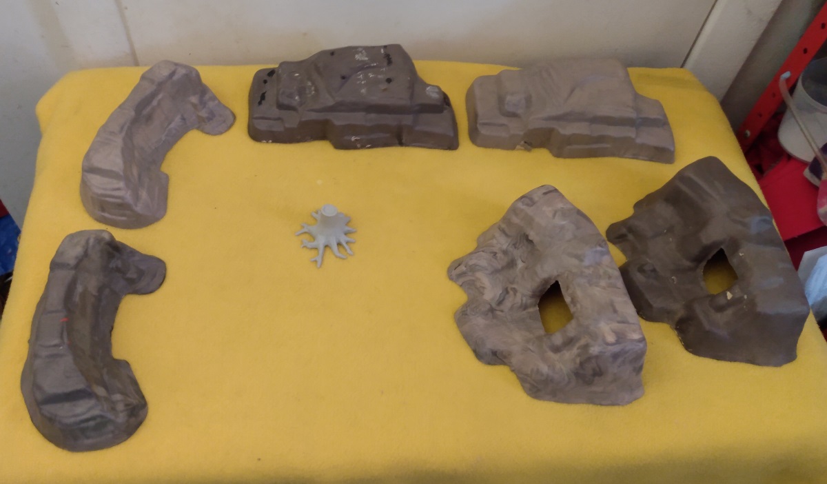 LAND TERRAIN PIECES AND A STUMP