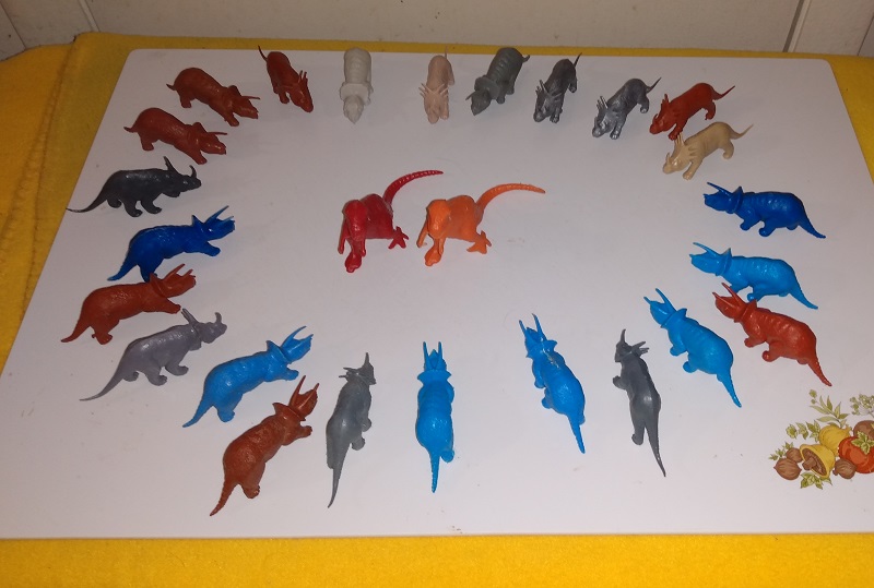 MPC TTYRANNOSAURS ARE SURROUNDED BY LARGE PACK OF ANGRY TRICERATOPS AND STYRACOSAURUS