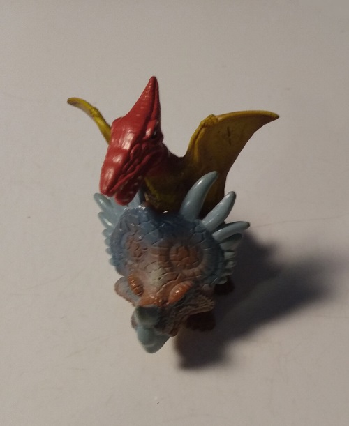 DINO FROZ PTERANODON RIDING A STYRACOSAURUS