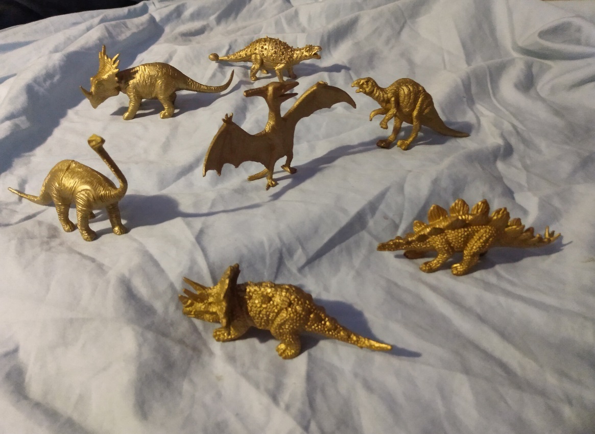 GOLD DINOSAURS