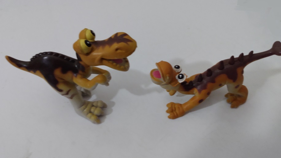 TWO SMILING DINOSAURS