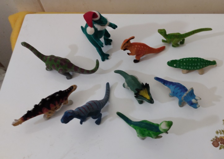 GROUP OF FLOCKED DINOSAURS