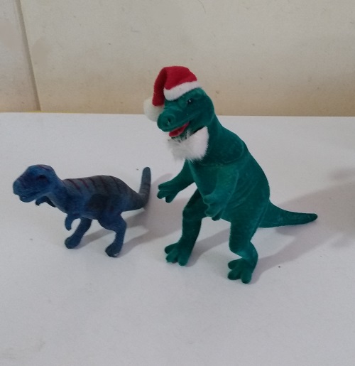 TWO FLOCKED DINOSAURS