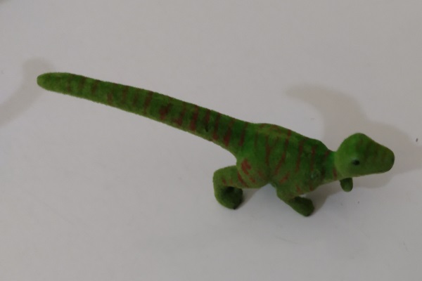 SKINNY LITTLE FLOCKED DINOSAUR
