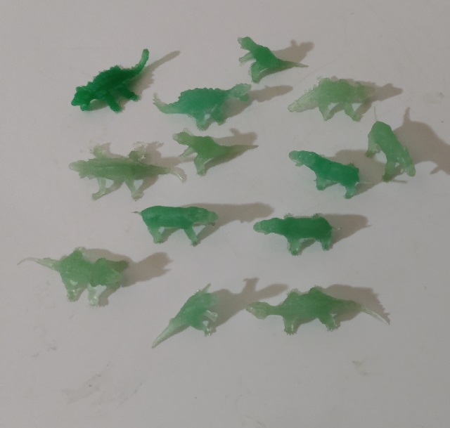 GREEN TRANSPARENT DINOSAUR GANG