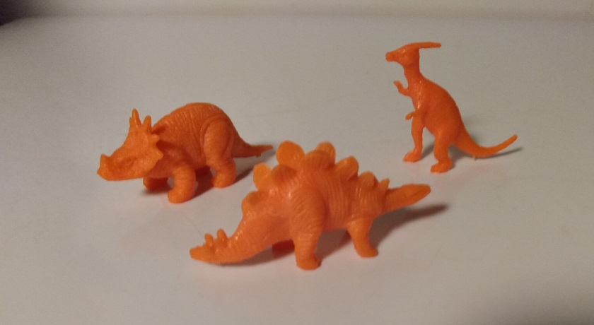 SMALL ORANGE DINOSAURS