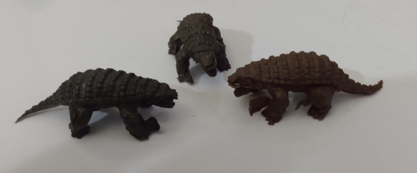 SMALL BROWN DINOSAURS