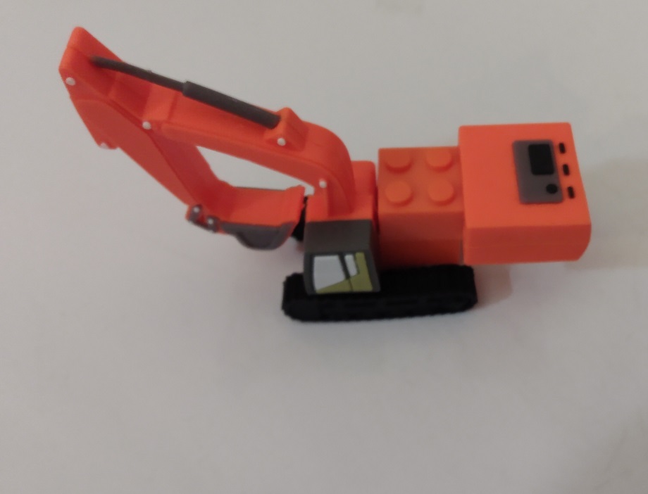 ORANGE CRANE WITH BRICK ATTATCHED