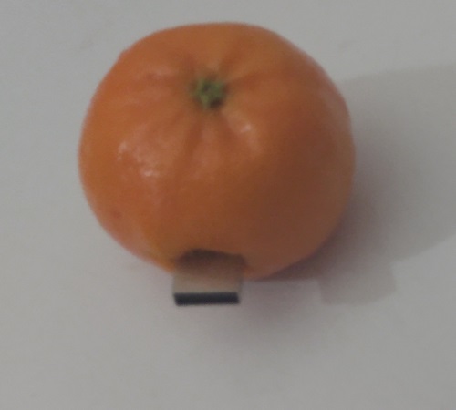 AN ORANGE WITH USB PORT